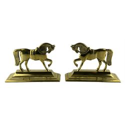 Pair of Victorian brass doorstops in the form of Horses, L24cm x H16cm 