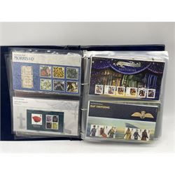 Queen Elizabeth II mint decimal stamps, mostly in presentation packs, face value of usable postage approximately 260 GBP, housed in a ring binder folder