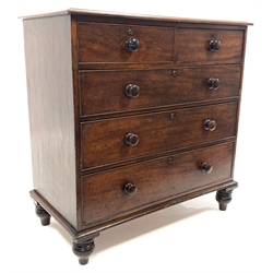 Early 19th century oak chest fitted with two short and three long drawers, raised on turned supports,  W105cm, H107cm, D55cm