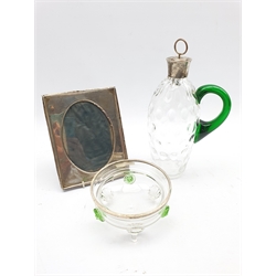 Dimpled glass flask with green handle and Edwardian silver collar Birmingham 1901, circular glass bowl with prunts and silver rim D13cm and a silver photograph frame  18cm x 14cm Birmingham 1911