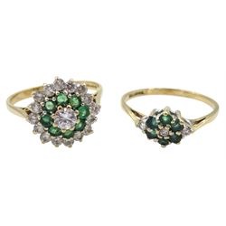 Two 9ct gold clear and green paste stone set cluster rings, both hallmarked