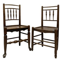 Two 19th century country Clisset chairs, the spindle back over seat, raised on turned supports, united by stretchers 