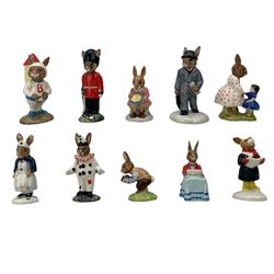 Group of ten Royal Doulton Bunnykins figures, including Carol Singer Bunnykins and Astro Bunnykins