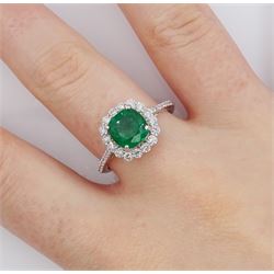 18ct white gold cushion cut emerald and round brilliant cut diamond cluster ring, stamped 750, emerald approx 1.85 carat, total diamond weight approx 0.55 carat