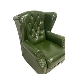 Georgian style wingback armchair, upholstered in buttoned green fabric with stud work, turned front feet