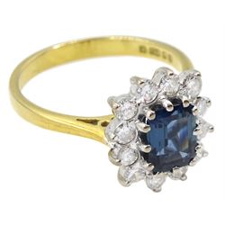 18ct gold emerald cut sapphire and round brilliant cut diamond cluster ring, London 1986