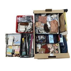 Sewing materials and accessories including a silver thimble, scissors, thread, buttons etc in one box