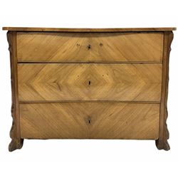 Continental walnut chest, serpentine top over three long drawers, raised on block supports with applied moulding to canted corners W111cm, H80cm, D57cm
