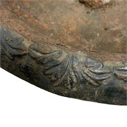Early 19th century cast iron kylix garden urn, the rim decorated with acanthus leaf over shallow bowl with gadrooned underbelly, on footed base with foliate decoration 