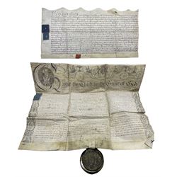 Late 18th century legal document concerning land tenancy in Great Driffield in the Easter Term of the thirty Ninth year of George III's reign with large wax seal in metal tin and an Identure dated 1887 