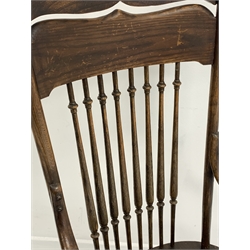 20th century oak spindle back chair with bentwood arms, W54cm