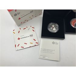 Two The Royal Mint United Kingdom 2020 silver proof piedfort five pound coins, comprising 'The 150th Anniversary of the British Red Cross' and 'The Remembrance Day', both cased with certificates (2)