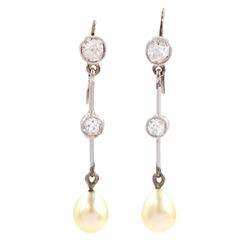 Pair of gold and platinum early 20th century old cut diamond and pearl pendant earrings, pear shaped pearls suspended from knife edge bars milgrain set with diamonds, to diamond surmounts, approx total diamond weight 0.35 carat, cased by Wartski, London