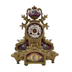 A late-19th century French mantle clock in a gilt spelter case surmounted with a hand painted porcelain urn decorated with garlands of flowers, two corresponding porcelain panels to the case and a central cameo portrait of a lady, conforming decorated porcelain dial with Roman numerals and gilt spade hands, with an eight-day countwheel movement striking the hours and half hours on a bell, case stamped “Brunfaut”, with pendulum, no key. 
H33cm W27cm D13cm
