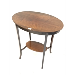  Edwardian mahogany oval occasional table with string inlaid top raised on slender splayed supports united by oval undertier, 68cm x 43cmn, H71cm  
