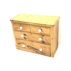 Victorian waxed pine chest fitted with two short and two long drawers, with white ceramic pull handles, W90cm 