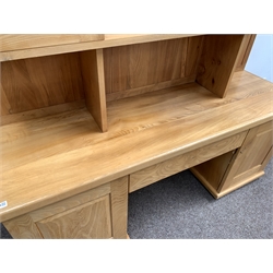  Lee Sinclair - a bespoke late 20th century solid elm dresser, arched top over two glazed doors each enclosing two adjustable shelves, one drawer to base flanked by two cupboards, Circa 1986 - with original invoice, W180cm, H205cm, D54cm  