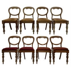 Set eight Victorian mahogany dining chairs, balloon back over drop-in upholstered seats, the frieze with applied moulded rails, on turned front supports and splayed rear supports