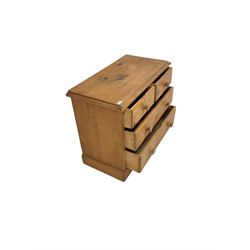 Pine chest fitted with two short and two long drawers, raised on a plinth base W88cm, H72cm, D45cm 