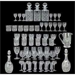 Suite of Royal Brierley Gainsborough pattern crystal drinking glasses comprising six large wine glasses, six small wine glasses, six brandy glasses, six hock glasses, six tumblers, six smaller tumblers, sixherry glasses, six port glasses, six Liqueur glasses, three square section decanters, pair of ovoid decanters and a water jug, most pieces bearing their original labels 
