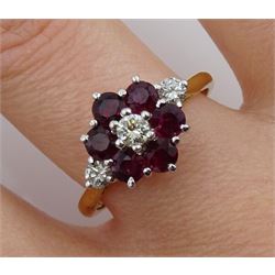18ct gold round ruby and round brilliant cut diamond cluster ring, London 1975