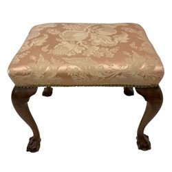 Early 20th century Georgian design mahogany footstool, seat upholstered in foliate patterned pale peach damask fabric, raised on cabriole supports terminating in ball and claw feet
Provenance: From the Estate of the late Dowager Lady St Oswald