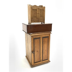 Late 19th century pine bedside cupboard with panelled door enclosing two shelves, (W52cm, H81cm, D50cm) together with an early 20th century oak table top cupboard, with two panelled doors over two drawers, (W36cm) and a stained pine box (W61cm)