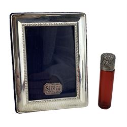 Modern silver photograph frame with millenium mark by Carrs of Sheffield 12cm x 9cm  and ruby glass scent flask with silver cover