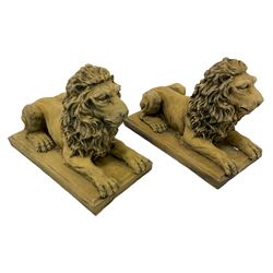 Pair cast stone recumbent lions, on rectangular plinth base