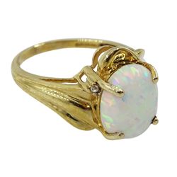 9ct gold oval opal and diamond chip ring, hallmarked