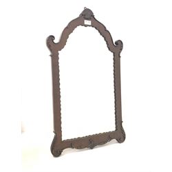 Edwardian mahogany framed wall mirror, the arched frame with shell pediment and scrolled frame 45cm x 77cm