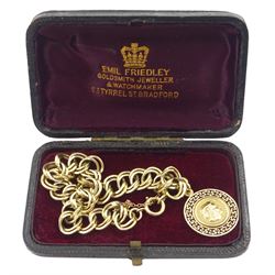 9ct gold fancy circular link bracelet, with gold key design charm depicting Alexander The Great and the Parthenon, in velvet and silk lined box
