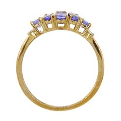 9ct gold oval tanzanite and baguette cut diamond cluster ring, hallmarked