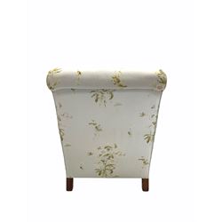 Late 19th / Early 20th century armchair upholstered in floral fabric, with feather filled squab cushion, raised on cabriole front supports W75cm, height to seat 47cm