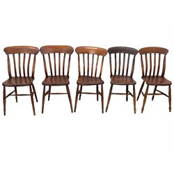 Set five Victorian stained elm oak and beech farmhouse dining chairs, shaped crest rail and bar back over saddle seats, raised on ring turned supports united by 'H' stretcher