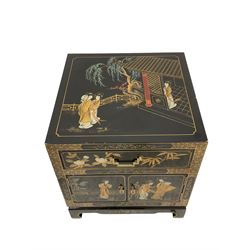 Pair Chinoiserie design cabinets, black lacquered with gilt decoration depicting figural scenes, fitted with single drawer and double cupboard