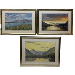 J E Ward (British 20th century): Sunrise and Sunset Landscape and Wild Flowers before Lake, set three pastel watercolours signed 34cm x 53cm (3)