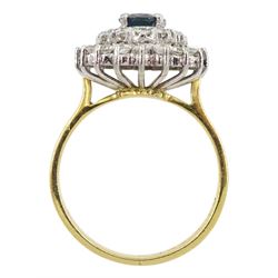 Gold oval sapphire and round brilliant cut diamond cluster ring, stamped 18ct