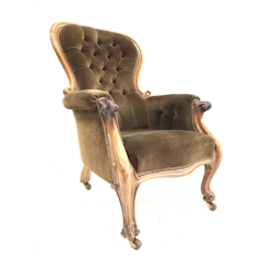  Victorian mahogany framed armchair, upholstered in deep buttoned brown velvet, with scrolled arm terminals, raised on cabriole supports and brass castors, W71cm   
