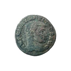 Roman Imperial Coinage, Maxentius (306-312AD) bronze follis, obv. Maxentius facing right, rev. Roma holding sceptre and globe seated within hexastyle temple 