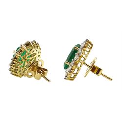 Pair of 18ct gold oval emerald and round brilliant cut diamond cluster stud earrings, stamped 750, total emerald weight approx 5.80 carat, total diamond weight approx 2.00 carat
