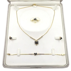 18ct gold round brilliant cut diamond and sapphire pendant necklace, matching screw back stud earrings, bracelet and ring, all stamped or tested