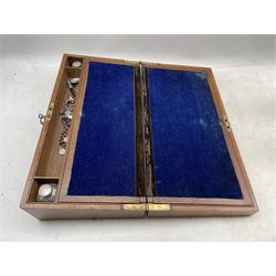 Victorian oak writing slope with brass plaque and escutcheon, blue velvet writing surface, three hidden draws and two glass inkwells L51cm, together with various books, Spudmatic gun, oval cameo etc  