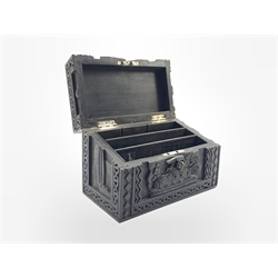  Late 19th Century Eastern ebonised stationery casket with carved decoration inset with a white metal plaque inscribed 'SFC' W22cm  