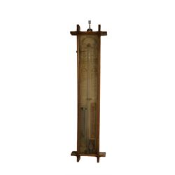 19th century Admiral Fitzroy barometer and a late 19th century two glass wheel barometer.
Fitzroy barometer with original paper scales, storm glass and thermometer, wheel barometer with an oak case and mother of pearl inlay, mercury thermometer and 8