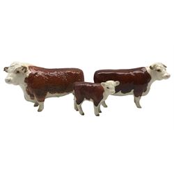 Beswick Hereford family comprising 'Champion of Champions' bull, 'Champion of Champions' cow and calf (3)