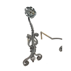 Pair of Blacksmith made wrought iron andirons, with hammered copper Yorkshire rose finials and scrolled decoration, 