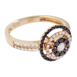 18ct rose gold black and white diamond halo cluster ring, with diamond set shoulders and a pair of matching 18ct rose gold earrings, both stamped 750