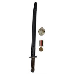 Wilkinson 1907 pattern bayonet dated 1917 with scabbard, Argyll and Sutherland Highlanders cap badge and George VI Special Constabulary Long Service medal to George Beaumont (3)
