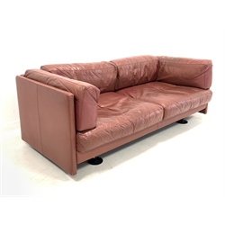 Mid 20th century two seat sofa, upholstered in red leather, with zipped on loose cushions, circa 1970s 